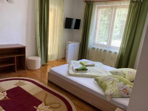 Postel nebo postele na pokoji v ubytování Casa Teodora