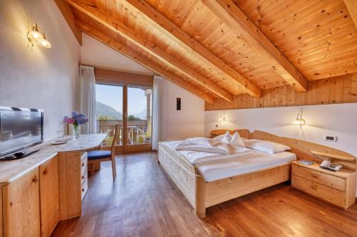 Postel nebo postele na pokoji v ubytování Hotel Stefanie
