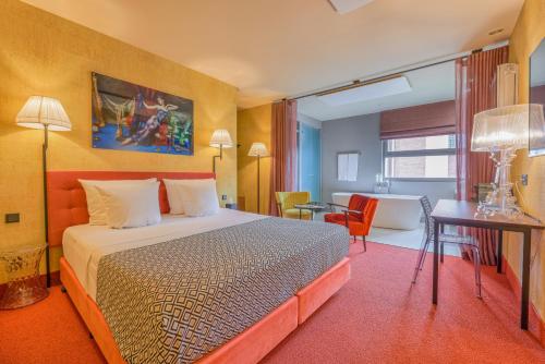 Ένα ή περισσότερα κρεβάτια σε δωμάτιο στο Boutique Hotel The Roosevelt
