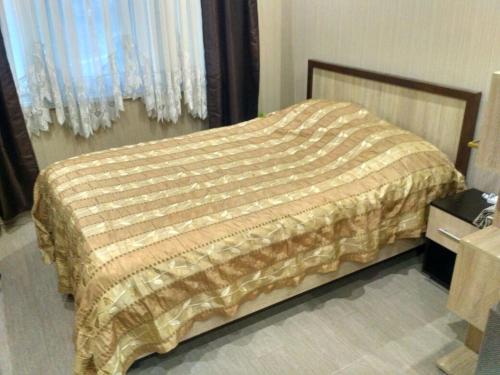 Кровать или кровати в номере Apartament у моря 500м Anapskaya 25