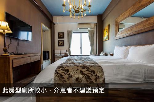 Кровать или кровати в номере 白陽二館-瑞億意象 mansion 6