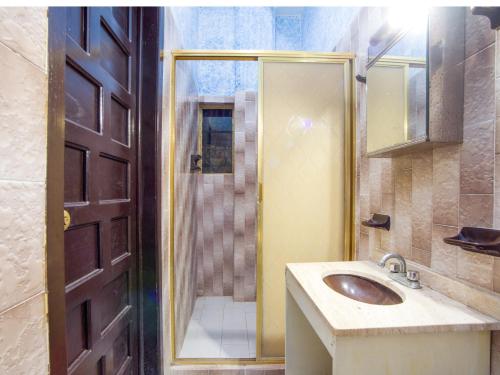 Ванная комната в Hotel Suites Tropicana Ixtapa