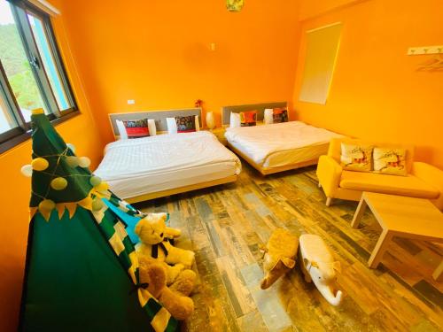 Ένα ή περισσότερα κρεβάτια σε δωμάτιο στο Tongxin Homestay