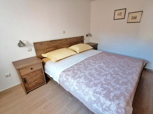 Ένα ή περισσότερα κρεβάτια σε δωμάτιο στο Vacation house Punta sunca