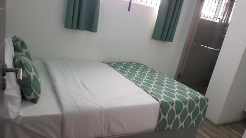 Letto o letti in una camera di La Mariposa Mauritius