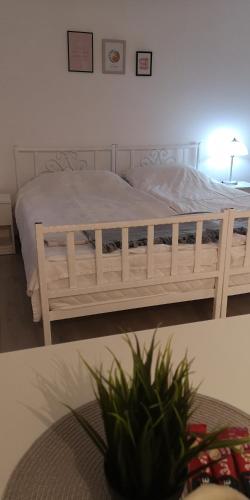 Letto o letti in una camera di Old Town Apartments