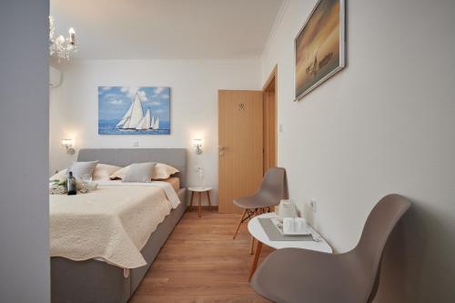 Postel nebo postele na pokoji v ubytování Rooms Antonio