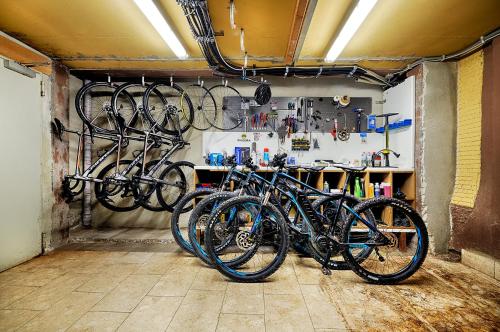 a group of bikes parked in a garage at Hotel Kronelamm im Schwarzwald in Bad Teinach-Zavelstein