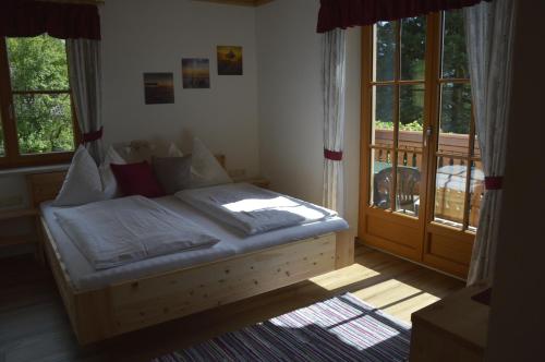 Un pat sau paturi într-o cameră la Haus Stückler