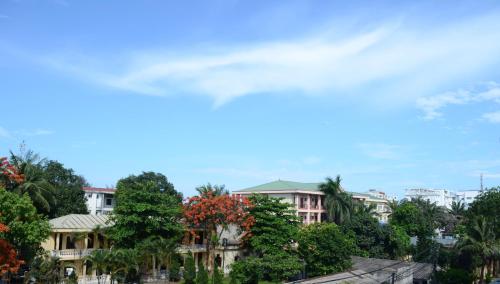 a view of a city with trees and buildings at Khách sạn Phương Dung in Cửa Lò