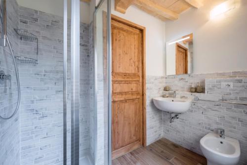 a bathroom with a sink and a toilet and a shower at Il Limone in Florence