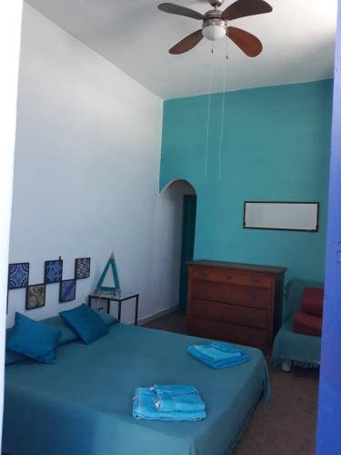 Posteľ alebo postele v izbe v ubytovaní Stromboliparadise Ficogrande