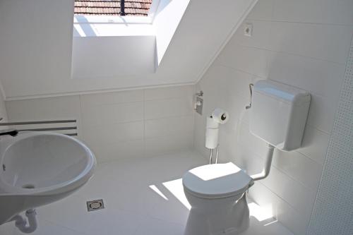 Kúpeľňa v ubytovaní Illés Apartman