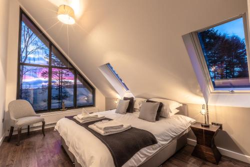 Katil atau katil-katil dalam bilik di Newlands Lodges