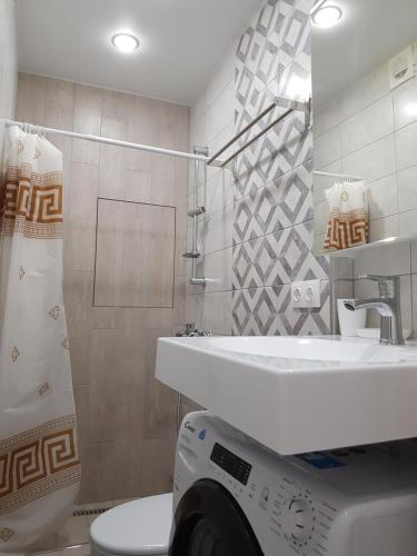 Phòng tắm tại Апартаменты у метро Москва, район Некрасовка