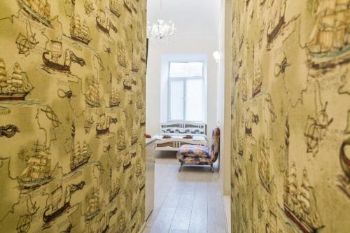 Ένα ή περισσότερα κρεβάτια σε δωμάτιο στο Appartment Grecheskaya 45/40