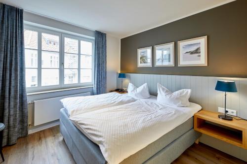 Postel nebo postele na pokoji v ubytování Hotel Friesenhof