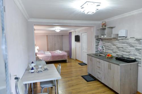 Kuchyň nebo kuchyňský kout v ubytování Cozy House
