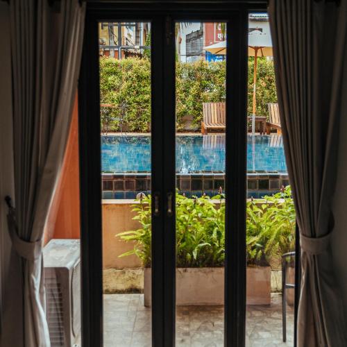La alberca dentro o cerca de Hotel Toscana Trat