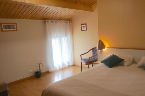 Ένα ή περισσότερα κρεβάτια σε δωμάτιο στο Appartement La Rochelle