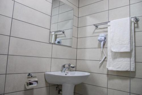 Kylpyhuone majoituspaikassa Hotel Premium