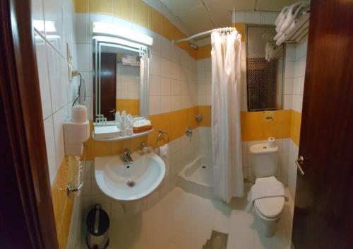 A bathroom at Rotana Al Mesk Hotel