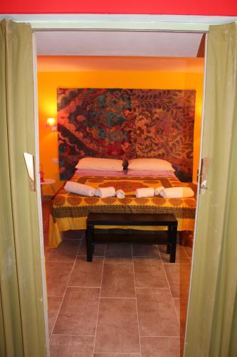 Ένα ή περισσότερα κρεβάτια σε δωμάτιο στο Ellysblue Guesthouse