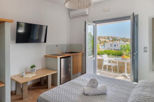 Ένα ή περισσότερα κρεβάτια σε δωμάτιο στο Aegean Paradiso Vacation Club