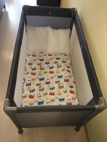 a bed in a room with a bed frame at Apartmán Bešeňová 289 in Bešeňová