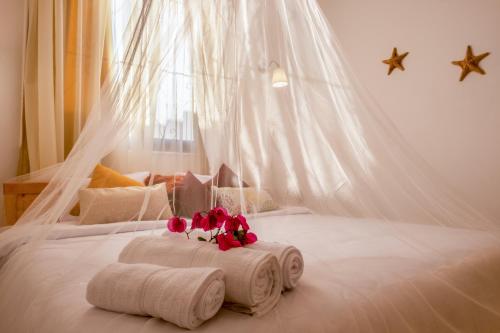 Un pat sau paturi într-o cameră la Villa Can Kiko