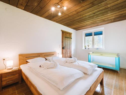 Ein Bett oder Betten in einem Zimmer der Unterkunft Apartment WILKY in Kaprun