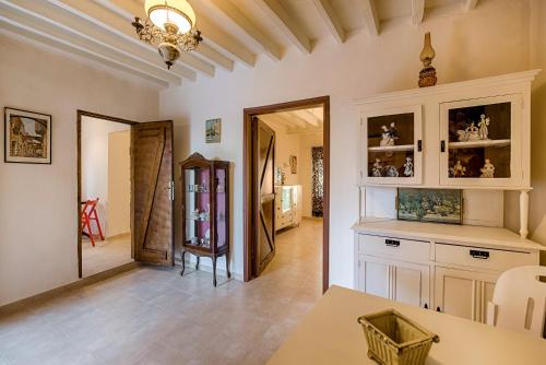 a living room with a table and a dining room at Kristina´s Apartments in Rhodes Town