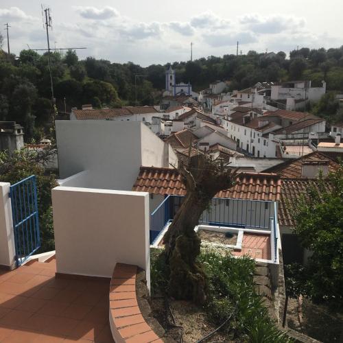 a view of a city from the roof of a house at Casas De Romaria in Brotas