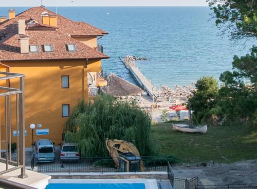 a house with a view of a beach and the ocean at Hotel Samara with Relax area in Balchik