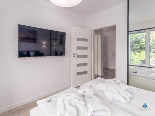 Posteľ alebo postele v izbe v ubytovaní 3L Apartments Nadmorskie Tarasy