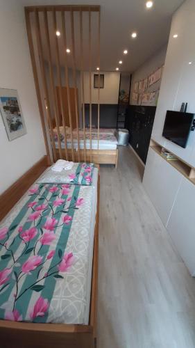 Posteľ alebo postele v izbe v ubytovaní Apartmán Tatran A 12