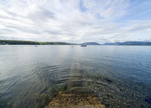 a view of a large body of water with boats at The Glenburn Hotel in Rothesay