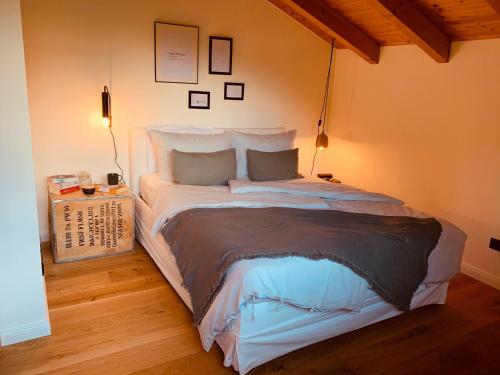 a bedroom with a large bed in a room at Mountainhome Birringer in Marktschellenberg