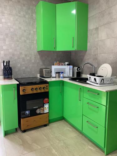Η κουζίνα ή μικρή κουζίνα στο Pavema Apartments