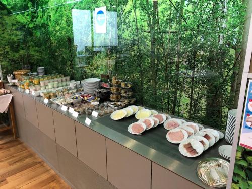 a buffet line with many different types of food at Hotel-Restaurant Ochsen in Blaubeuren