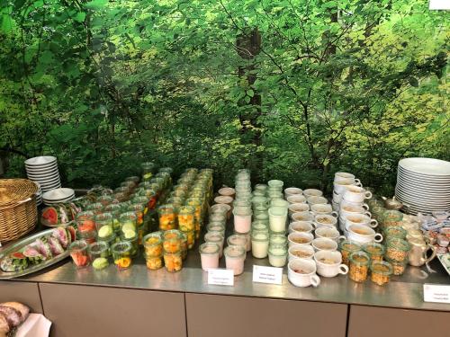 a buffet with many different types of food on a table at Hotel-Restaurant Ochsen in Blaubeuren