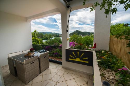 a view from the front porch of a house with a view at Apartmani Galić in Ploče