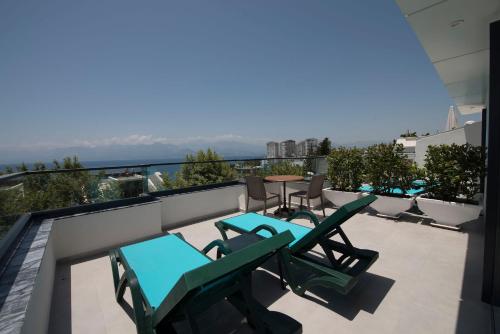 Balkoni atau teres di Pure Blanche Hotel
