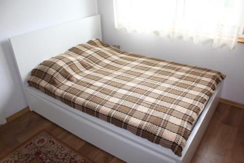 Postel nebo postele na pokoji v ubytování Domek w NABO