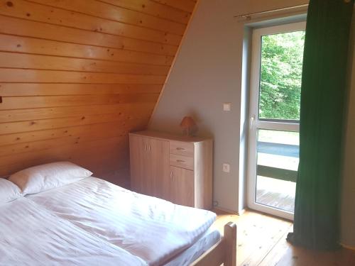 Postel nebo postele na pokoji v ubytování CIME Ekonomik