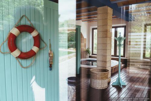 a house with a lifesaver on the front door at Sa Vaqueria in Porto Cristo
