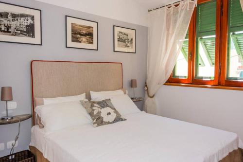 מיטה או מיטות בחדר ב-Ossi di Seppia