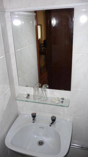 Koupelna v ubytování Hotel Larbelo