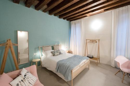 Postel nebo postele na pokoji v ubytování Mirandolina Venice Exclusive Apartment