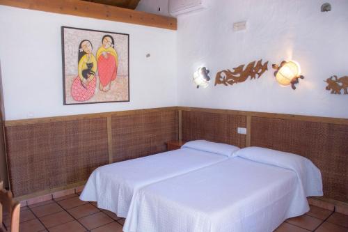 Cama o camas de una habitación en Complejo Vacacional Los Cortijillos-Solo adultos